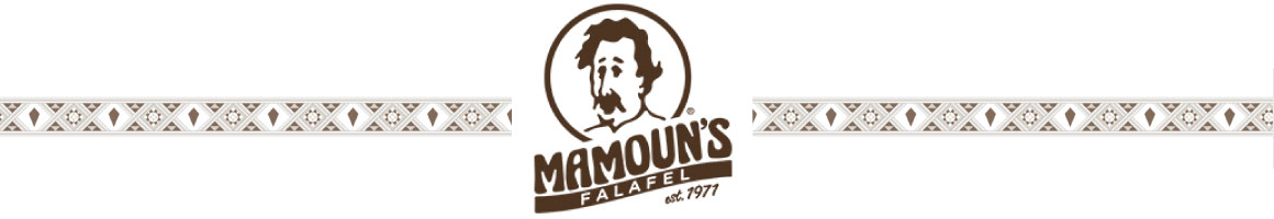 Eating Mediterranean Middle Eastern Falafel at Mamoun's Falafel restaurant in Hoboken, NJ.